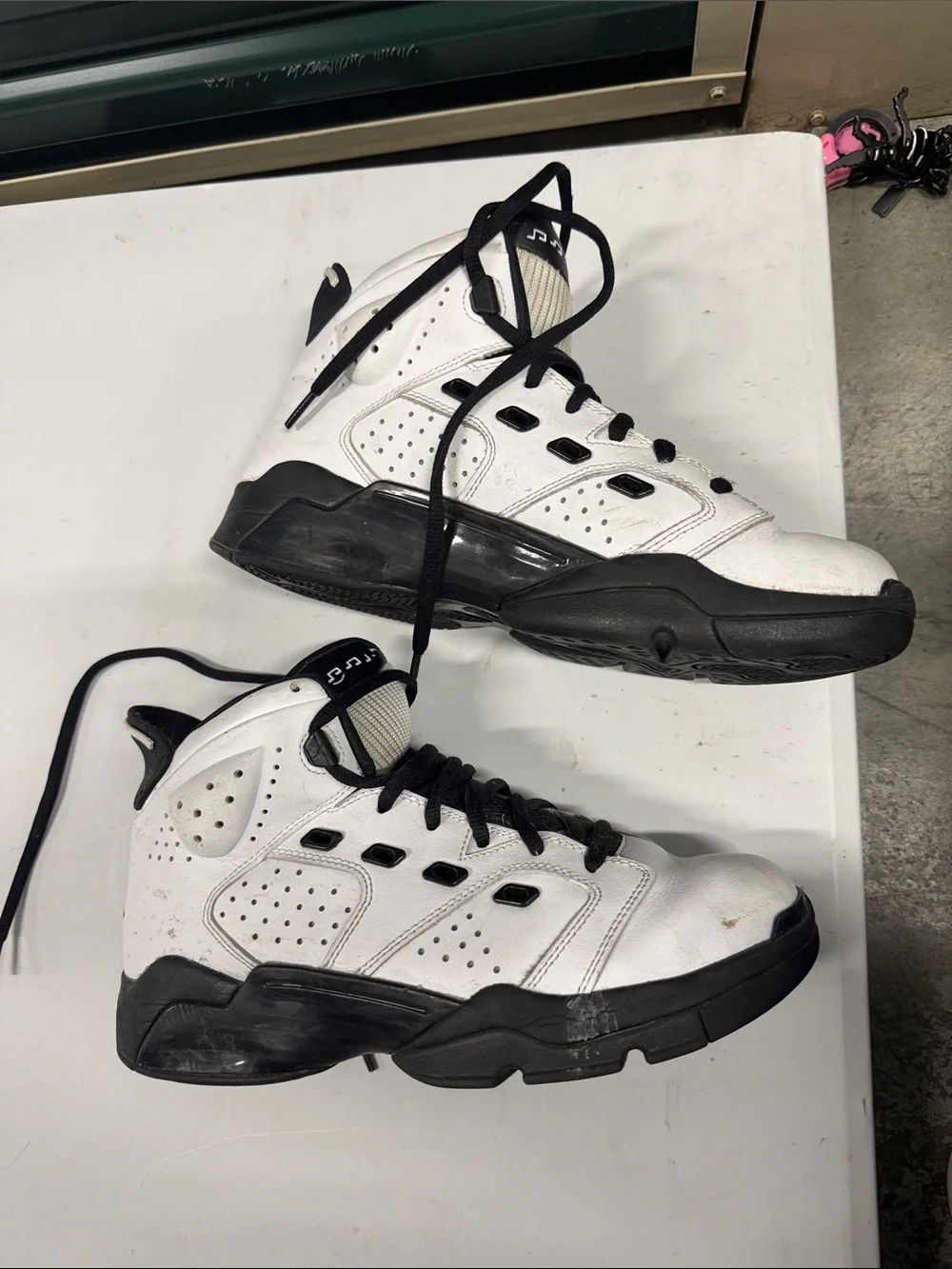 White and Black High-Top Athletic Sneakers